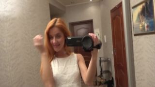 Appealing redhead sexpot Kelly Kline jerks off two fat cocks