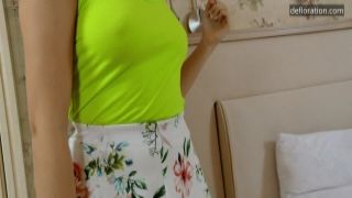 Kinky blonde tosses legs over head and fists pussy